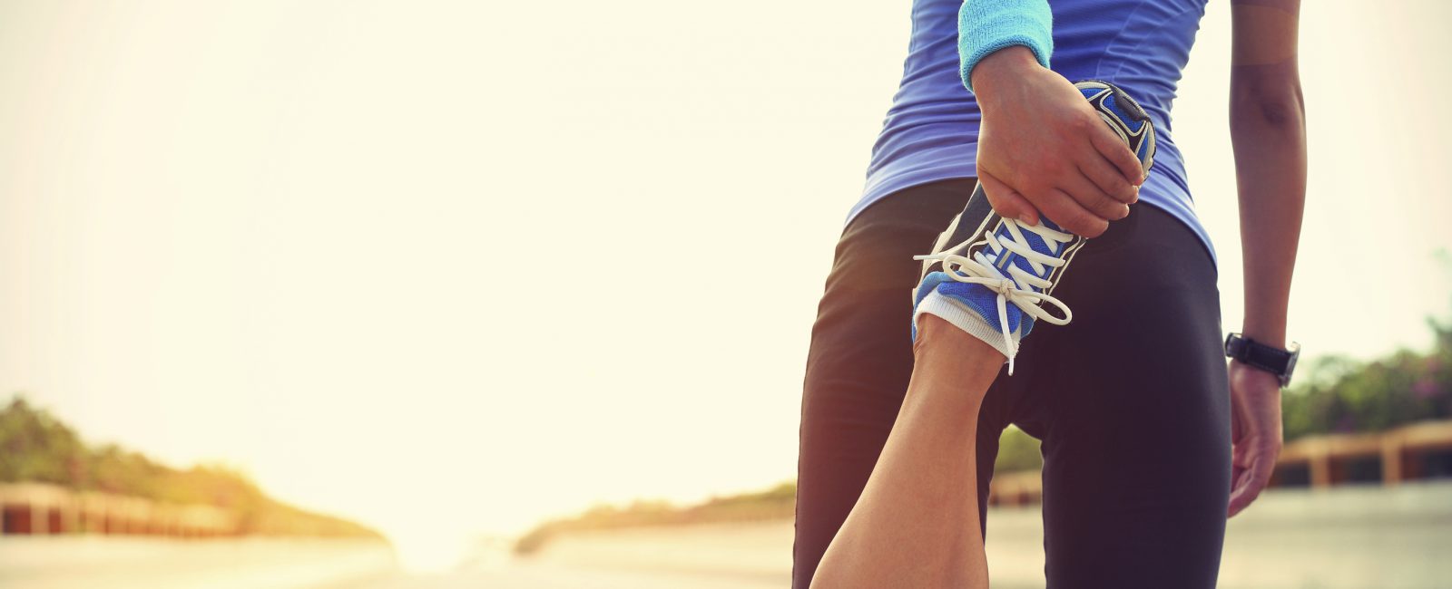 young woman runner warm up outdoor